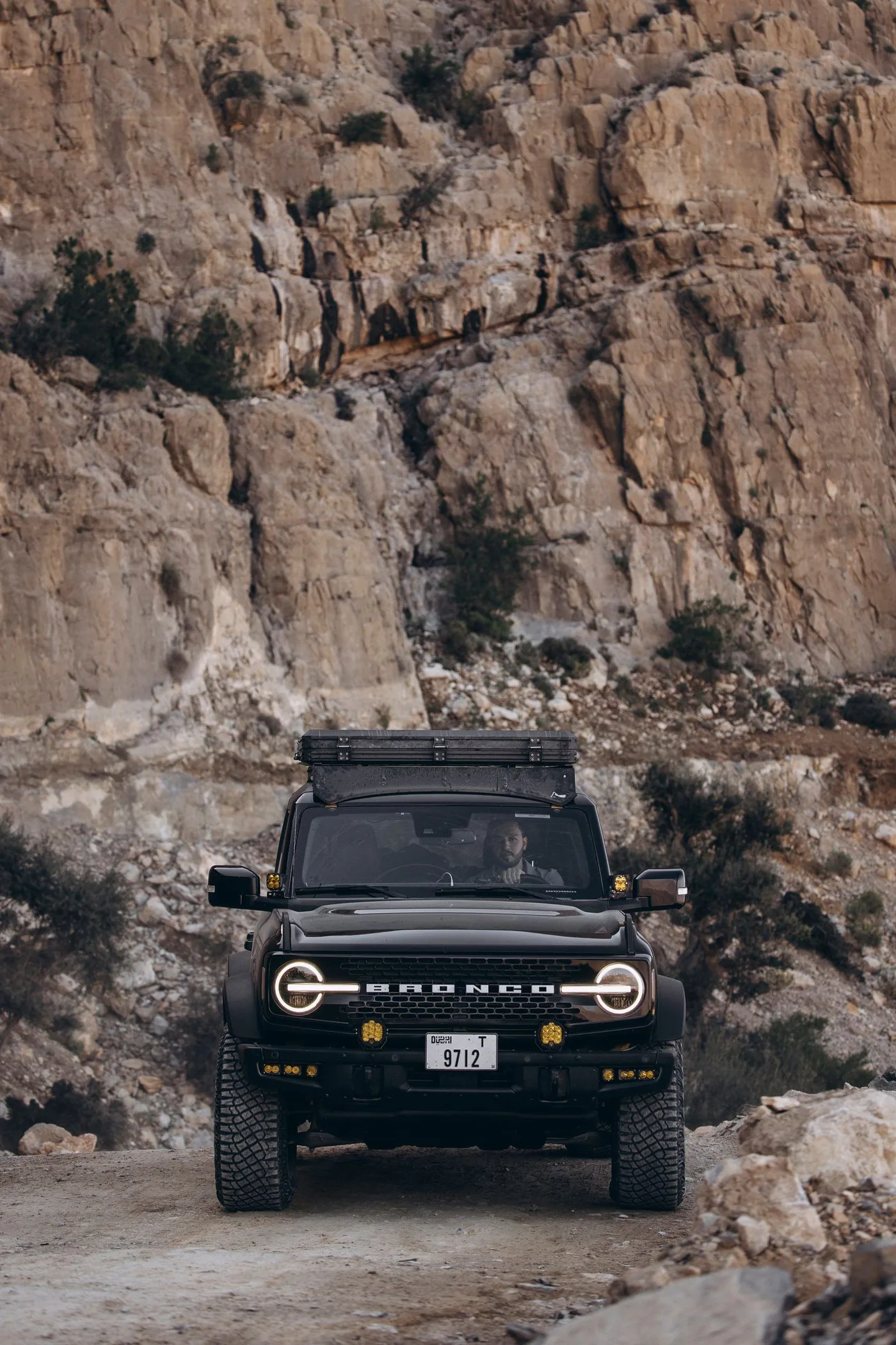 Black Ford Bronco at the cliffs